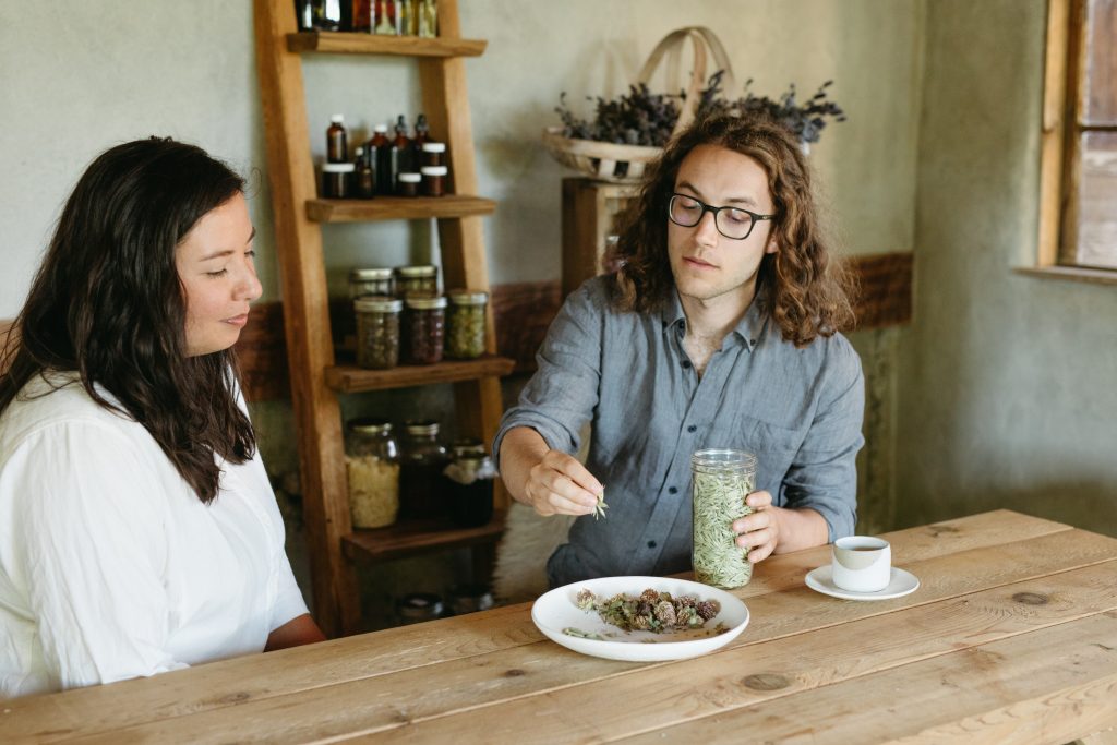Student doing a herbal consultation with a client